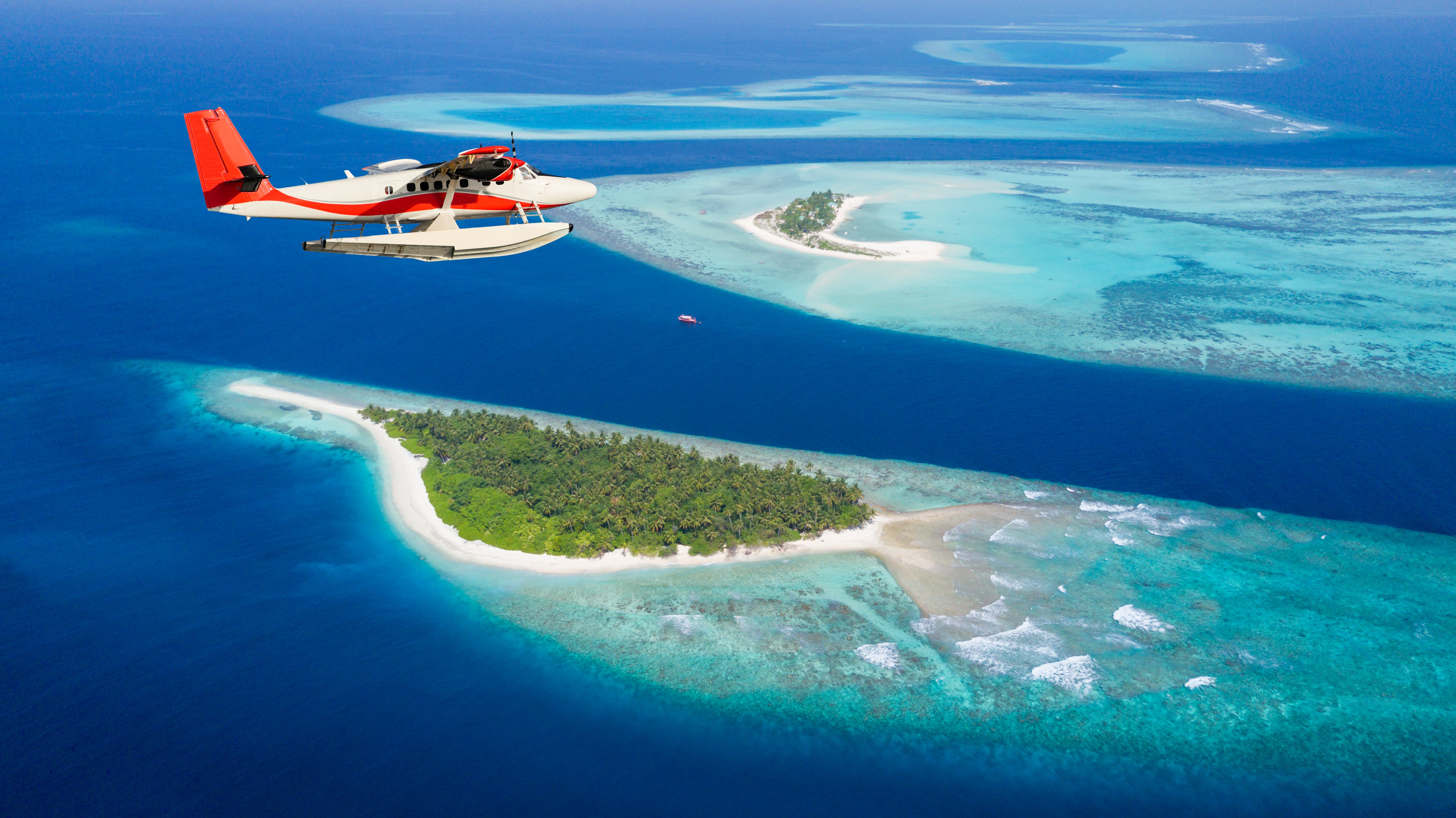 Seaplane flying over Maldives