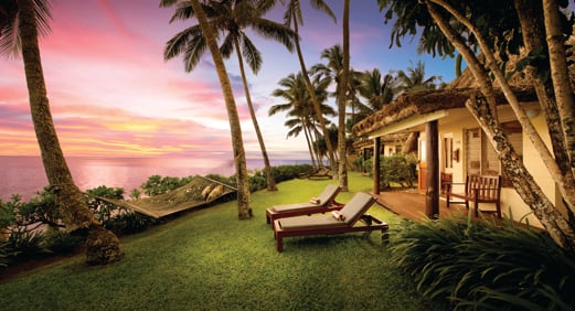 Sunset view of the Outrigger Fiji Beach Resort pool